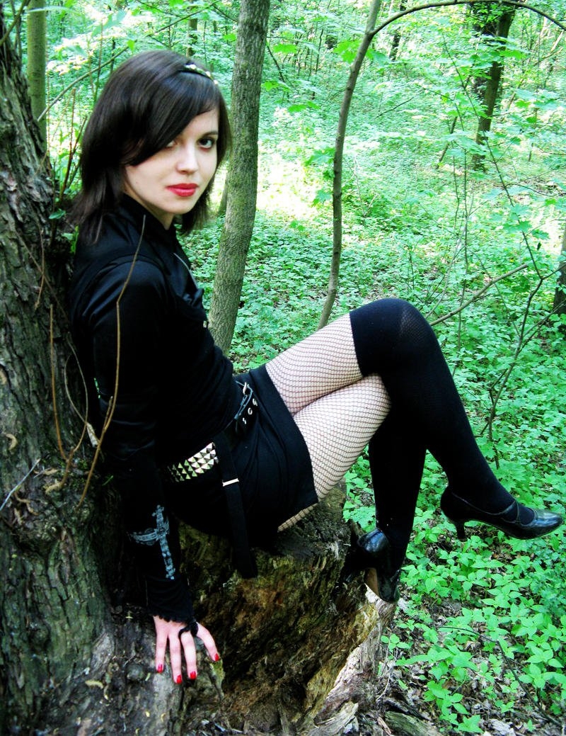 Brunette Gothic Girl wearing Black Opaque Stockings on Black Fishnet Pantyhose